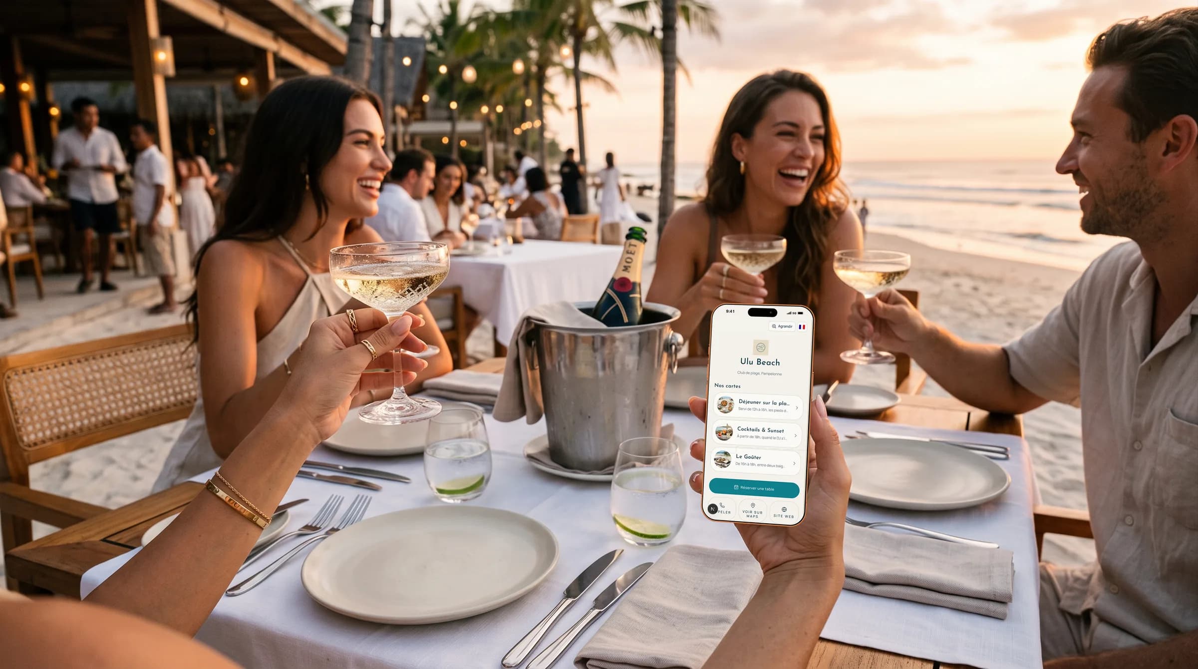 Guests browsing an online menu at sunset in a beach club