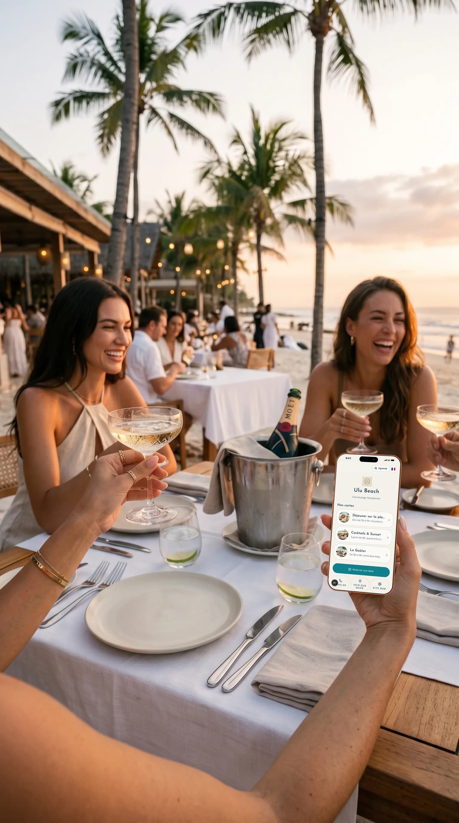 Guests browsing an online menu at sunset in a beach club
