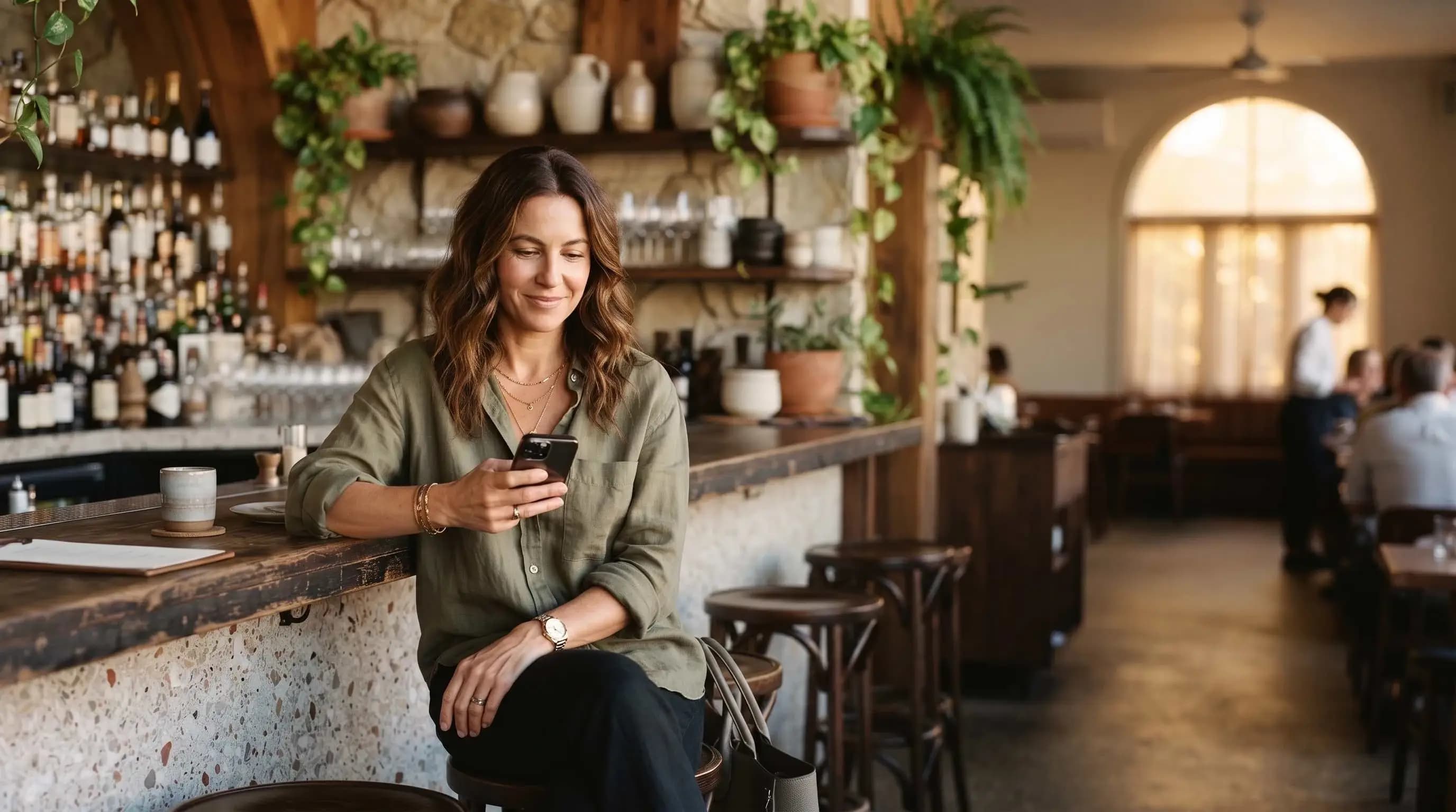 Restaurateur refining their digital menu on a phone